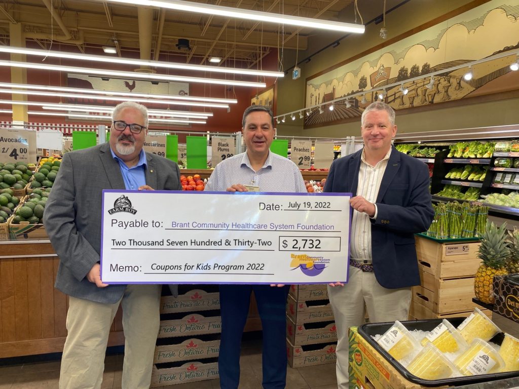 BCHS Foundation Board members Andy Straisfeld (left) and Ken McNaughton (right) pictured accepting a generous contribution from Farm Boy Brantford Store Manager Gino Caputo (center) in the amount of $2,732.