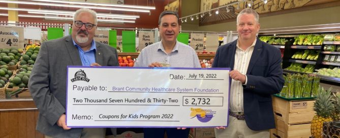 BCHS Foundation Board members Andy Straisfeld (left) and Ken McNaughton (right) pictured accepting a generous contribution from Farm Boy Brantford Store Manager Gino Caputo (center) in the amount of $2,732.